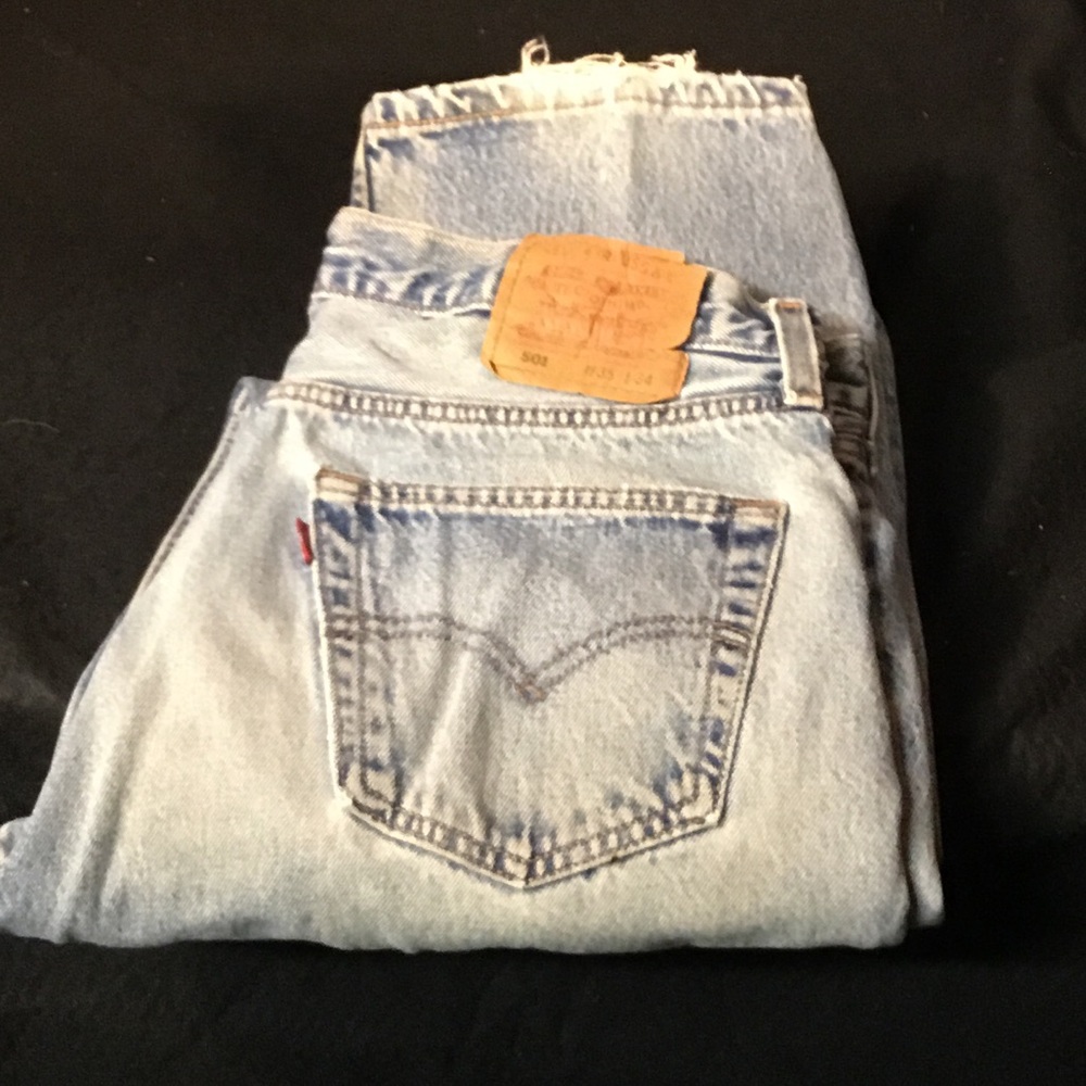 Levi's 501, Light Blue Denim Jeans
Frayed hems. 35 x 34